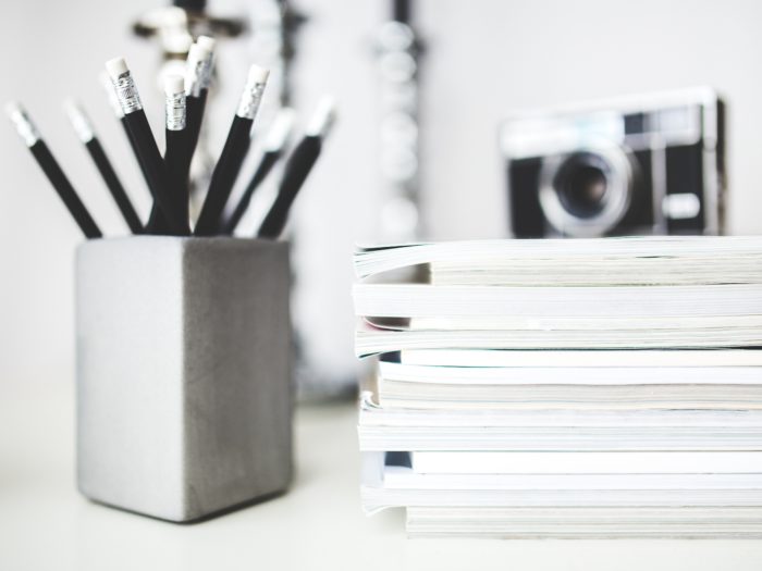 paper and pencils on desk